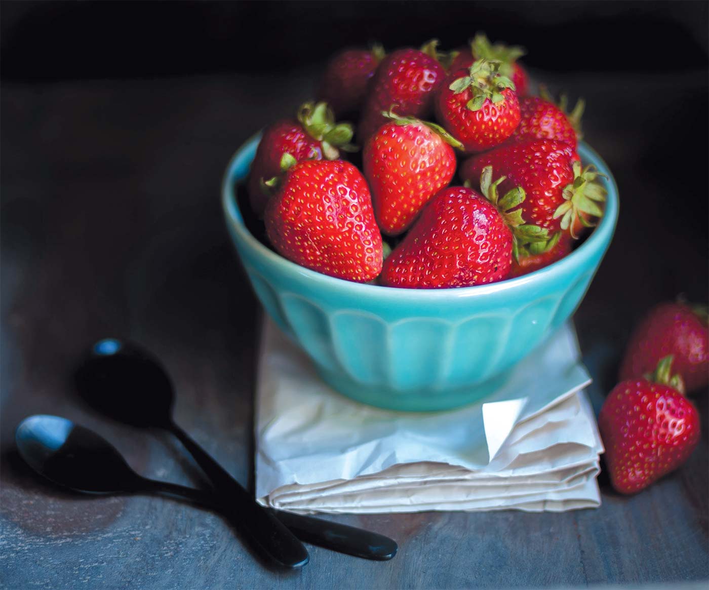 blue bowl of strawberries