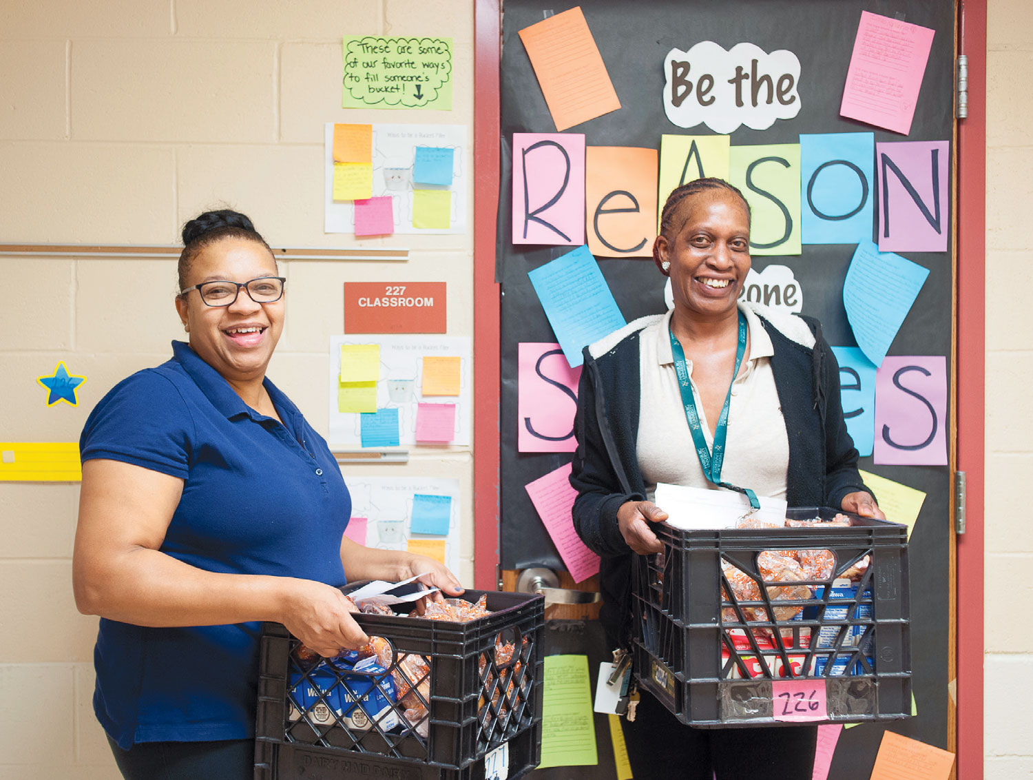 Marlow Williams (left) and Brenda Walton deliver breakfast to every classroom at H.A Brown School each morning.