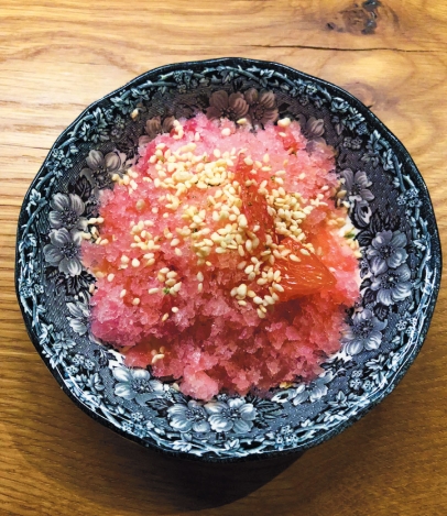 Citrus shaved ice topping with sesame seeds