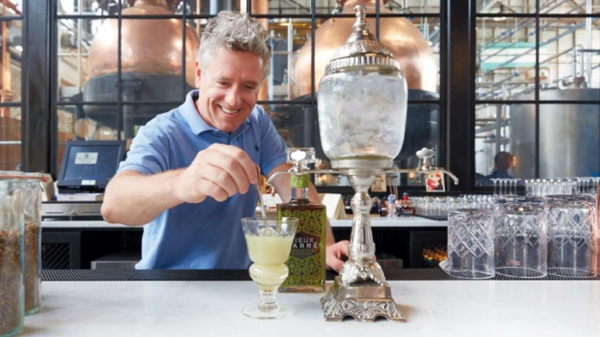 Andrew Auwerda preparing a classic absinthe cocktail with Philadelphia Distilling’s Vieux Carré