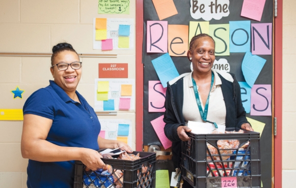 Marlow Williams (left) and Brenda Walton deliver breakfast to every classroom at H.A Brown School each morning.